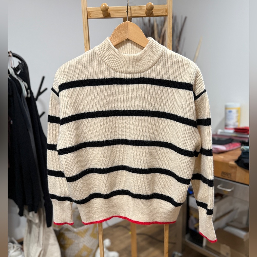 Angel Eye Cream and Black Knit Top